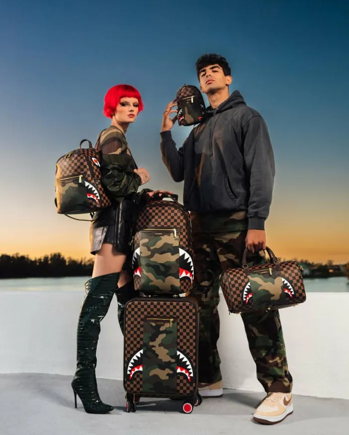 EXTERIOR GOLD ZIP POCKET SHARKS IN PARIS MINI DUFFLE Bags SPRAYGROUND